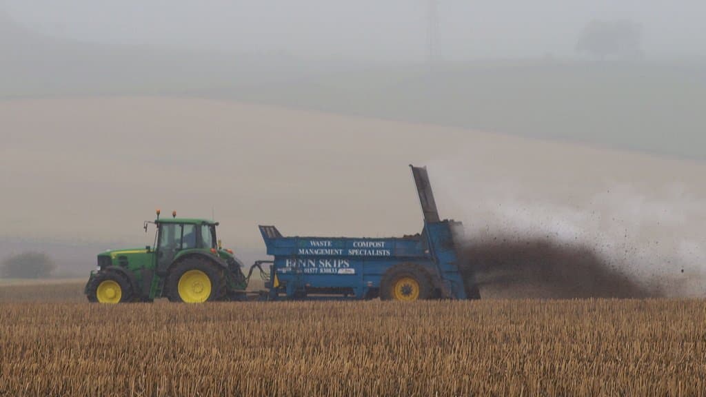 Fertiliser spread across an agricultural field