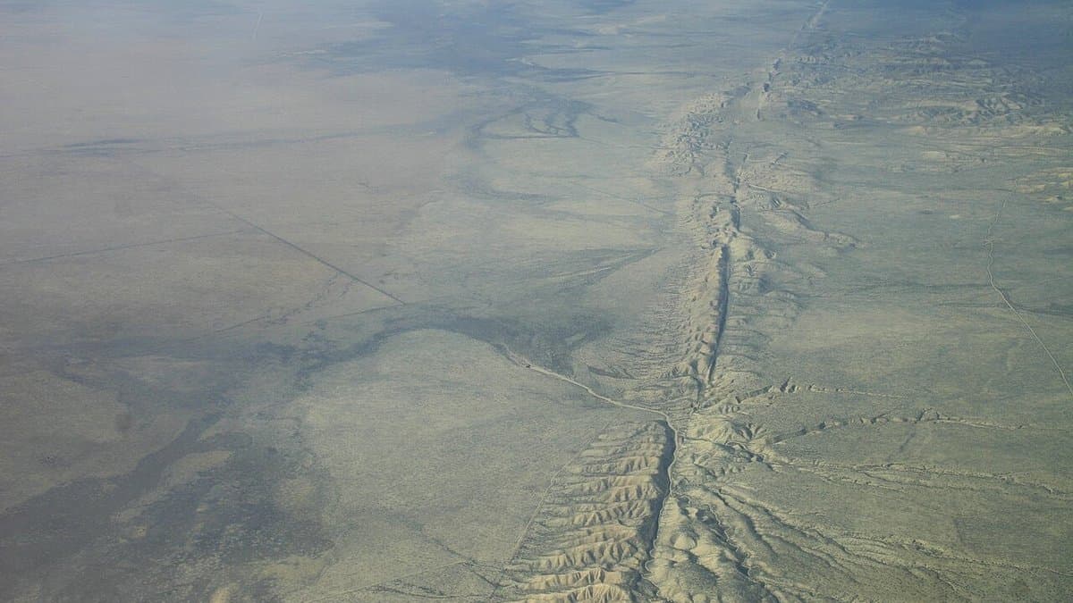 Aerial view of the San Andreas Fault cutting a straight scar across the dry Carrizo Plain
