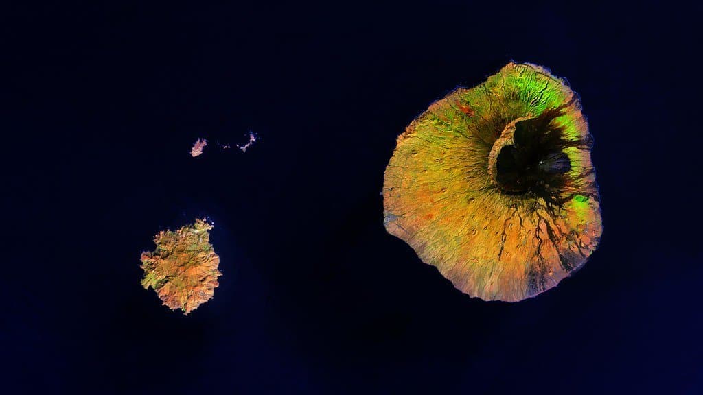 Satellite view of Fogo island in Cabo Verde, showing the volcano's summit and the horseshoe-shaped collapse scar on its eastern flank