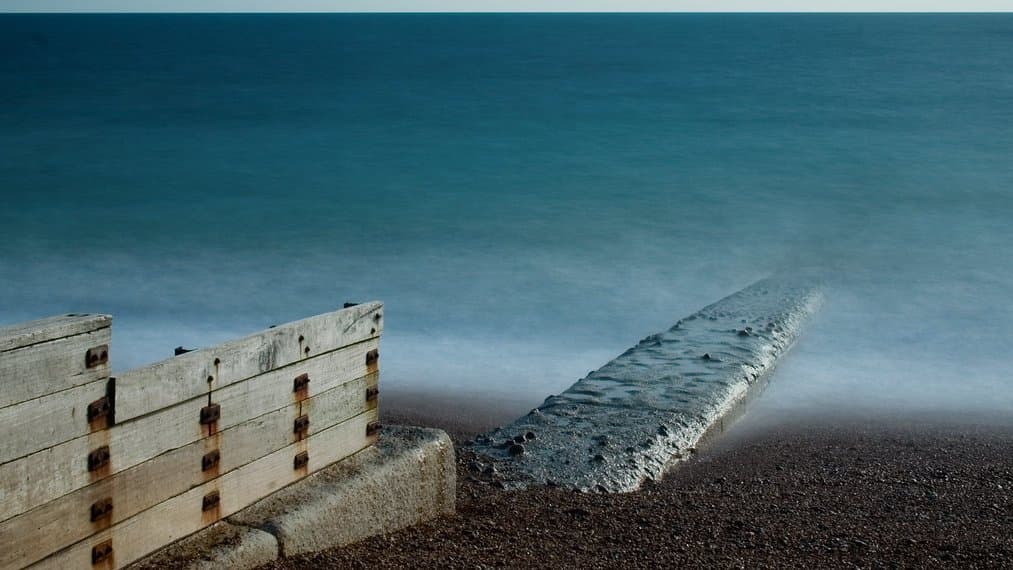 Waves breaking on the open ocean surface