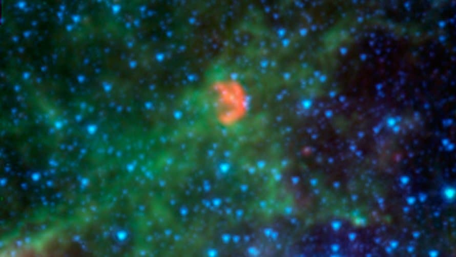 A supernova remnant showing tangled shells of glowing gas expanding into space