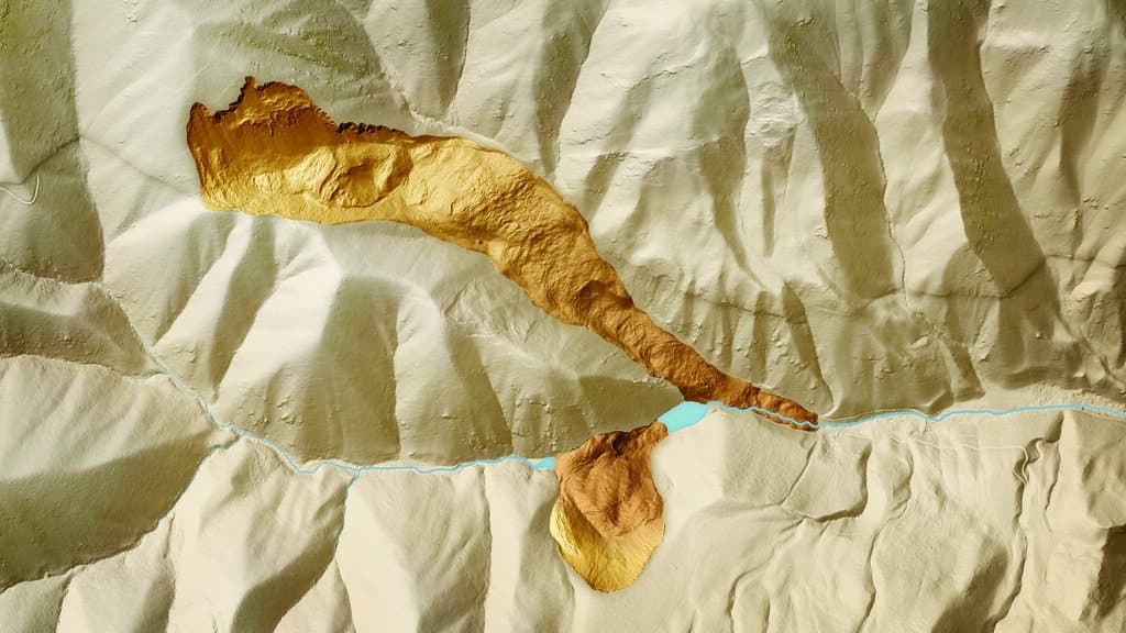 A lidar-derived hillshade image revealing a linear fault scarp cutting across forested terrain.