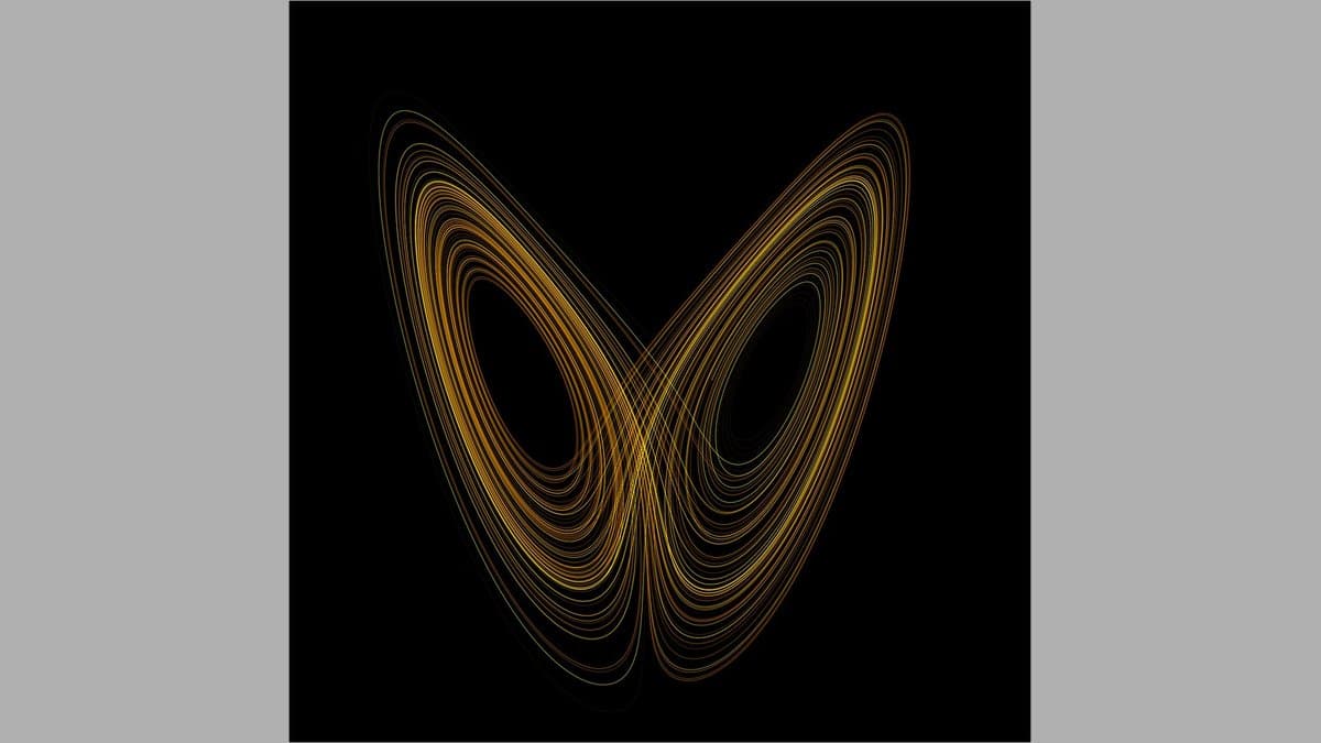 A butterfly-shaped tangle of fine orange curves on a black background: the two lobes of the Lorenz attractor.