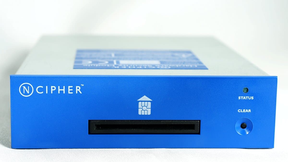 A blue nCipher hardware security module with a smartcard slot in its front panel, photographed against a white background.