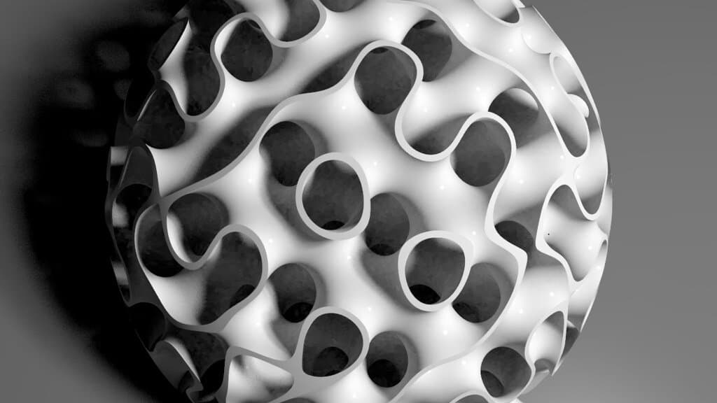 Computer rendering of a sphere formed from a gyroid lattice, a smoothly curving surface pierced by rounded openings.