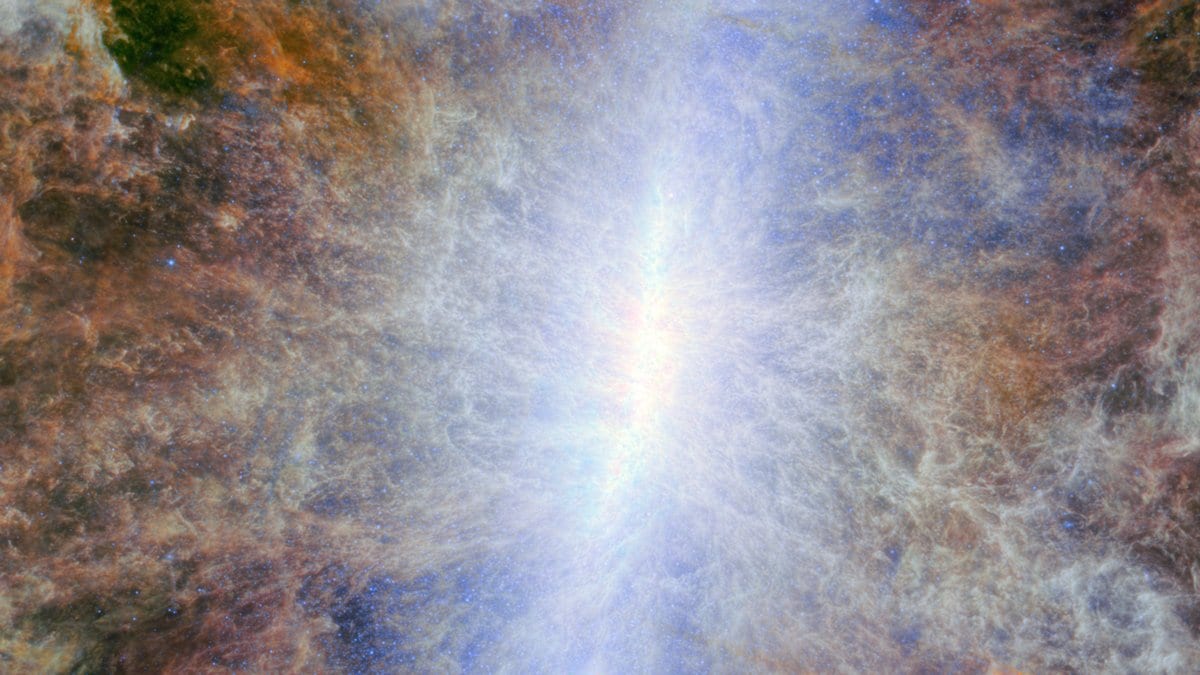 Infrared view of a starburst galaxy's brilliant core, with filaments of dust and gas streaming outward above and below the galactic plane.