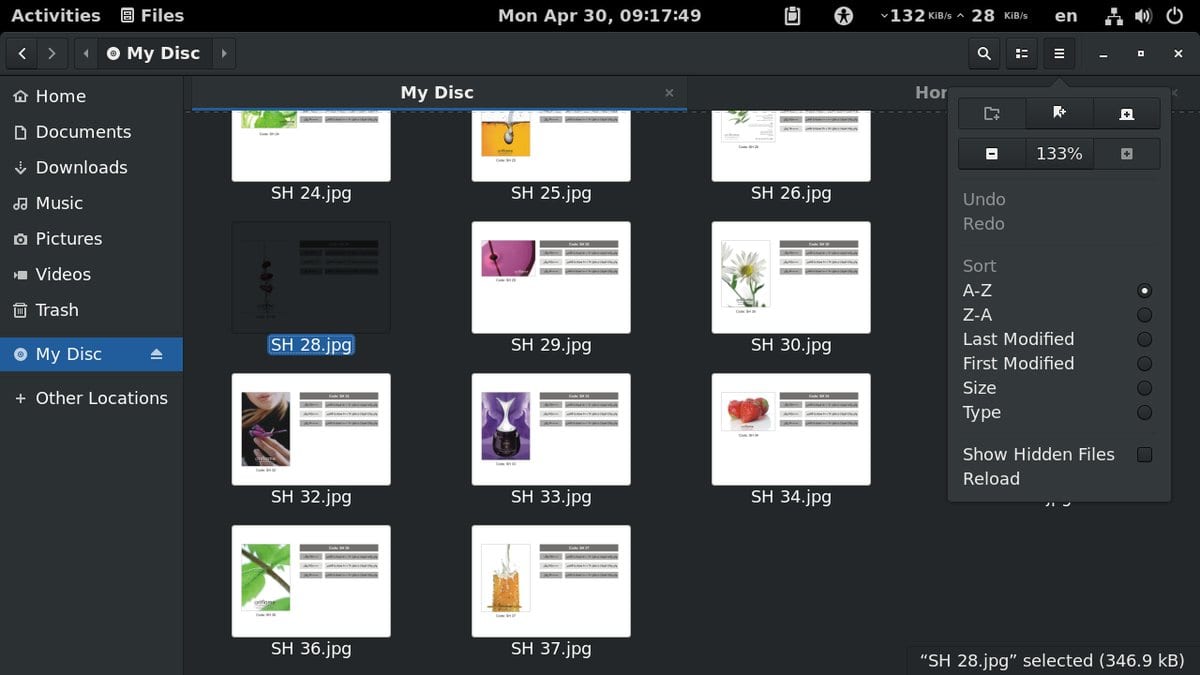 Screenshot of a Linux file manager window showing a folder of image files with their file names, and an open menu offering to sort by last modified.