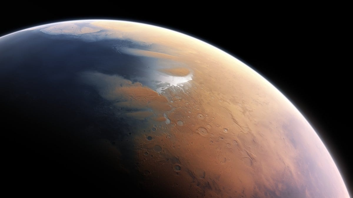 Artist rendering of early Mars seen from space, with a dark ocean filling the northern lowlands beside orange cratered highlands.