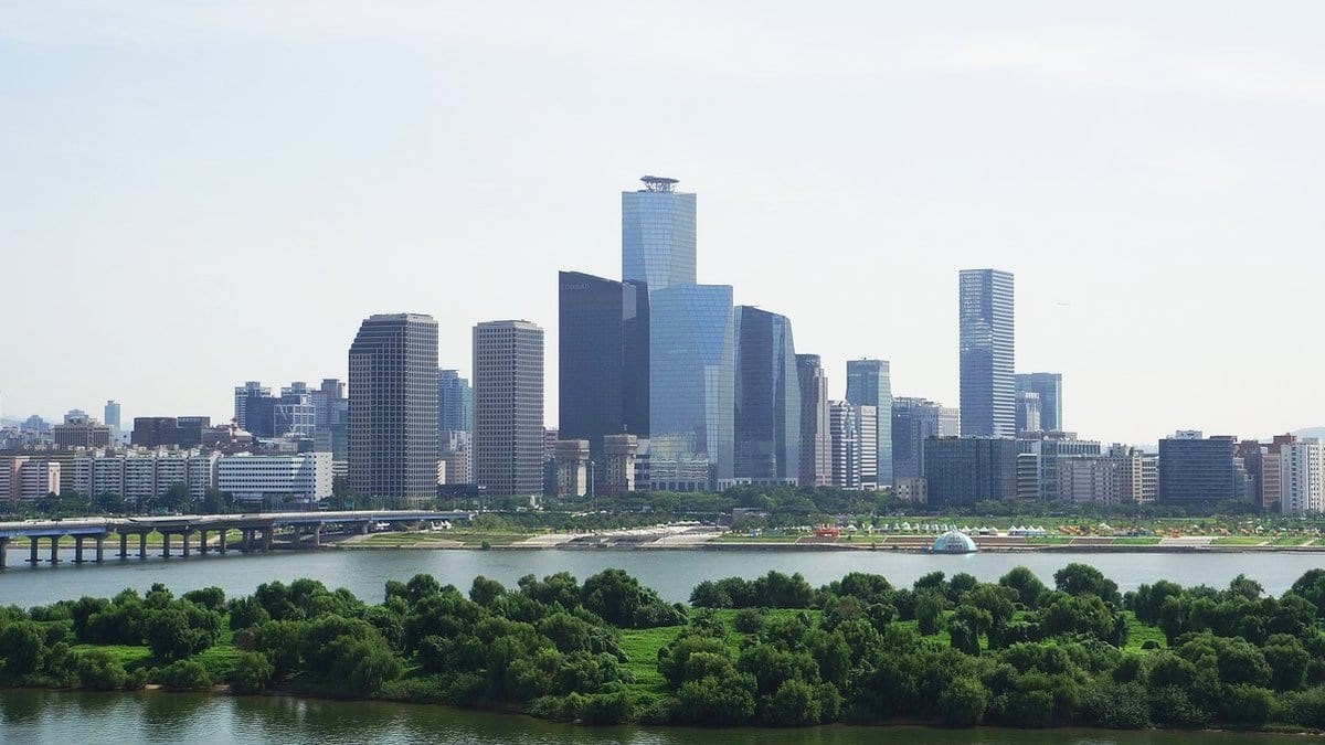 Daytime view of high-rise office towers on Yeouido island in Seoul, seen from across the Han River.