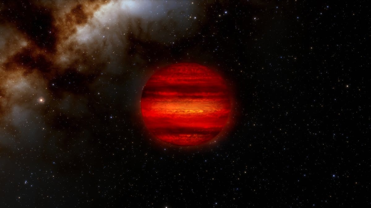 An artist's illustration of a brown dwarf: a banded, glowing red-orange sphere lit from within, set against a starfield and a dusty nebula.