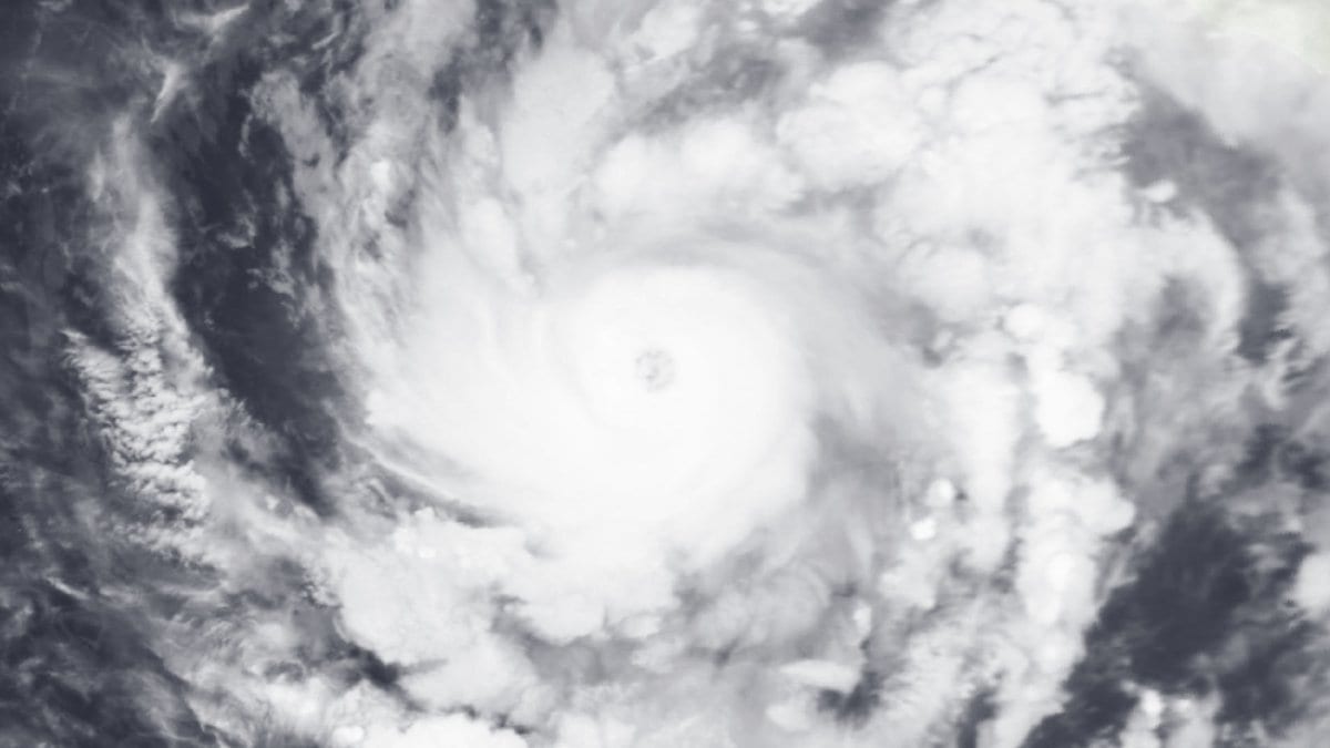 Satellite image of Hurricane Trudy, a Category 3 hurricane, showing a well-defined eye and spiral rain bands over the eastern Pacific Ocean off Mexico's coast