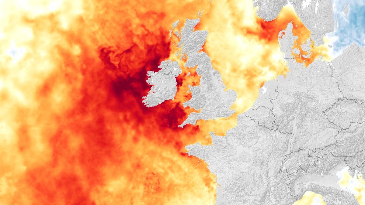 Map of sea surface temperature anomalies across the northeast Atlantic, deep red water west and south of Ireland and around Britain, with the land masses of Ireland, Britain and western Europe in gray.