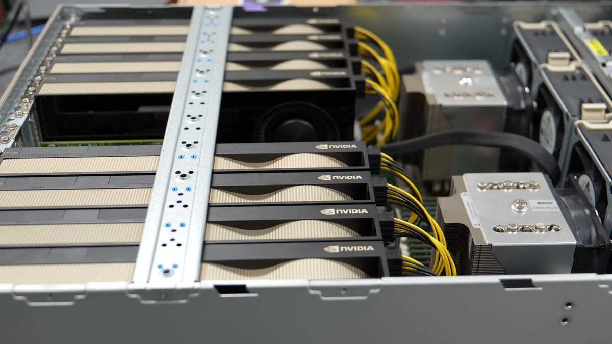 Several graphics accelerator cards installed side by side inside a rack mount server chassis.