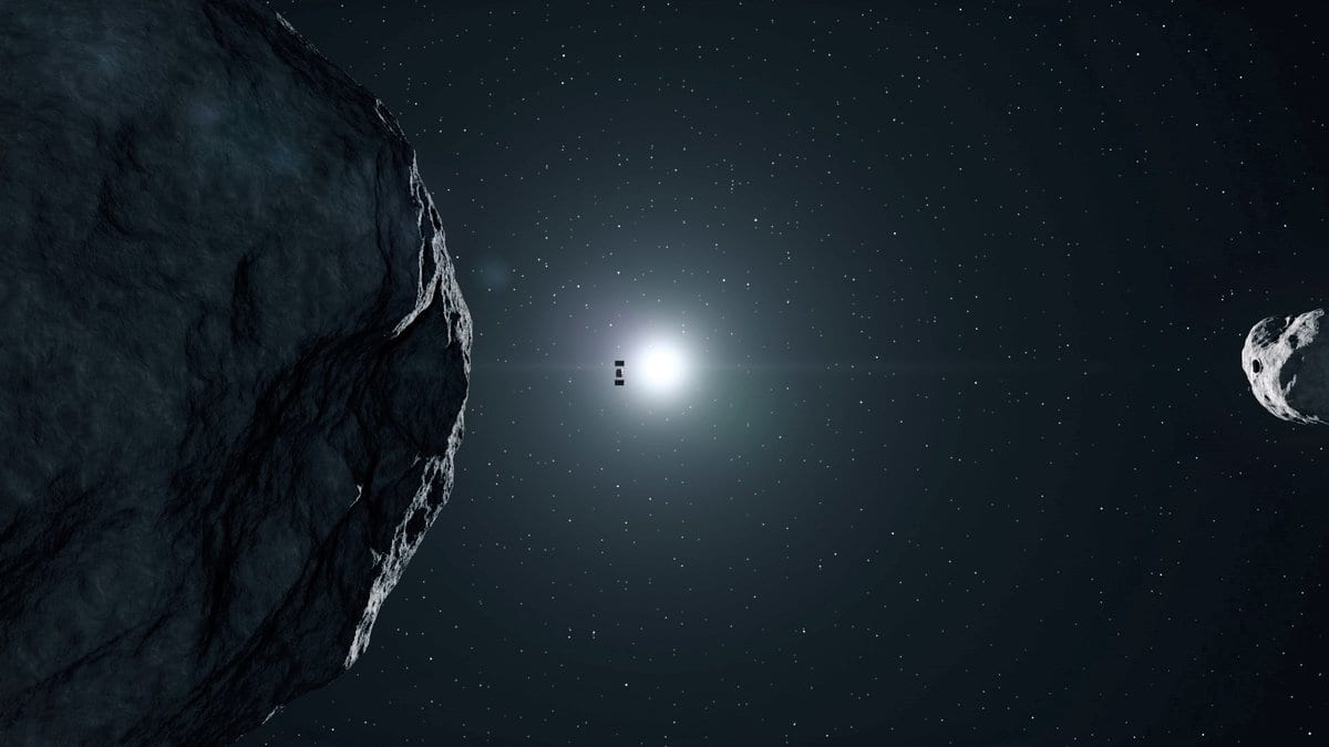 An illustration of the Hera spacecraft silhouetted against the Sun, with the large asteroid Didymos at left and the much smaller Dimorphos at right.