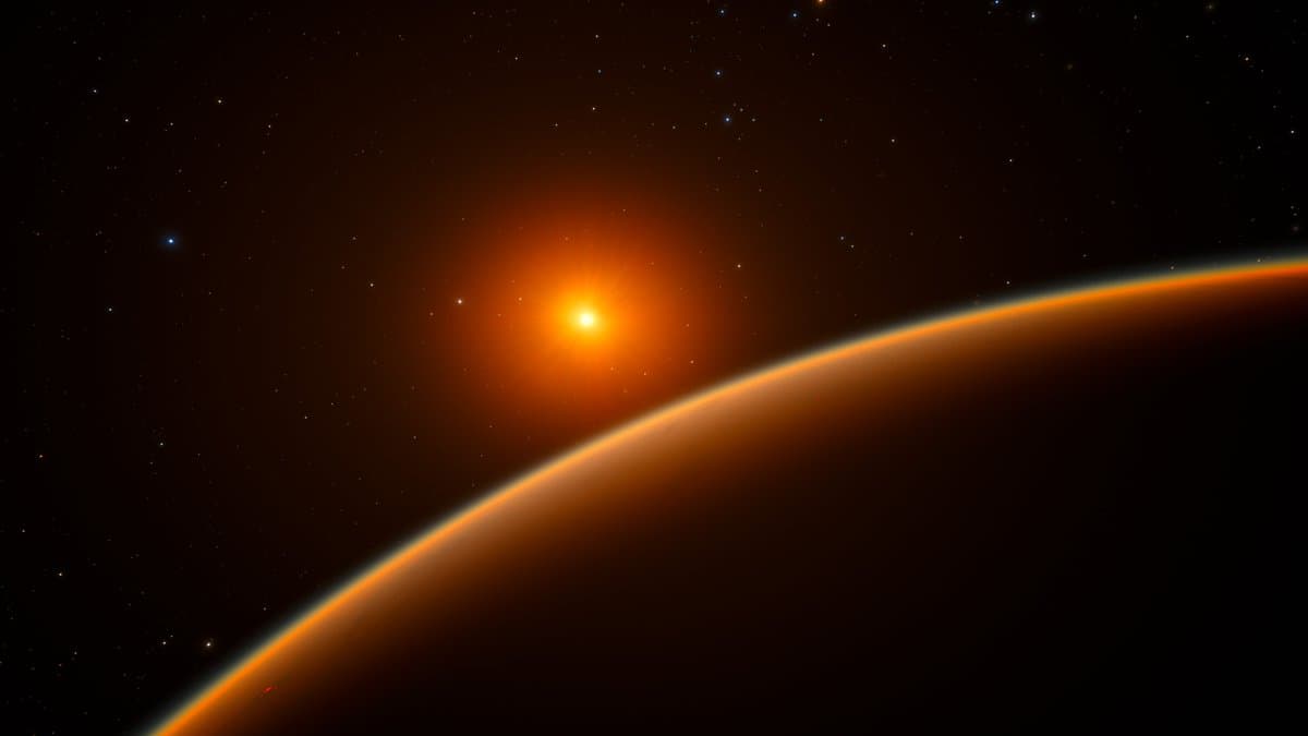 Artist's impression of the rocky super-Earth exoplanet LHS 1140 b, a reddish-brown world lit by its dim red-dwarf star